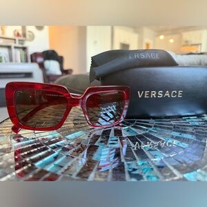 Versace VE 4384B sunglasses in transparent red acetate Medusa with Crystals